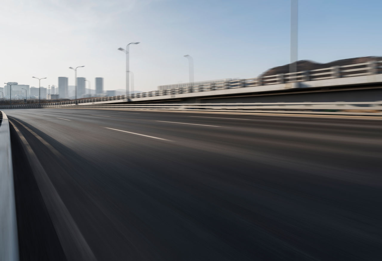 An empty highway . Blurry vision indicating speed